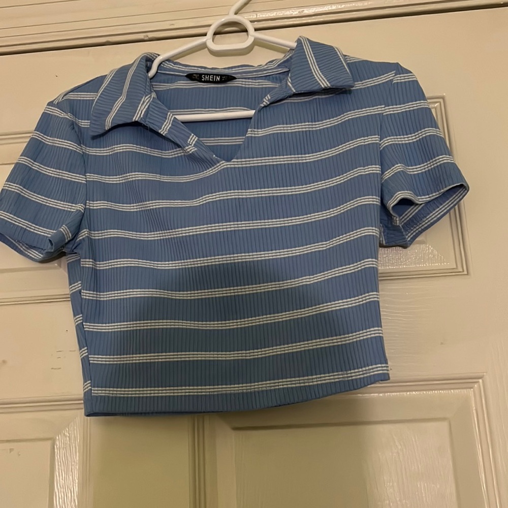 Cute blue and white stripped color shirt from shein. Worn once only to try on!
